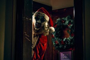 Terrifier 3,Damien Leone,horror,slasher,Art The Clown,box office,brutalność,gore,przemoc,polska premiera,recenzje,krytycy,widzowie,sukces finansowy,Rotten Tomatoes,splatter,camp,seria horrorów,kino,Monolith Films